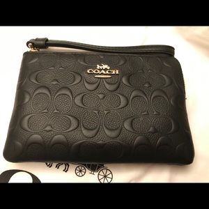 Coach embossed wristlet